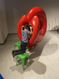 Max with a sound game at the Fenomena exhibition at the First Floor of the NEMO Science Museum