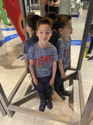 Max with a double mirror at the Fenomena exhibition at the First Floor of the NEMO Science Museum