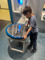Max with a maze game at the Energize game at the Technium exhibition at the Second Floor of the NEMO Science Museum