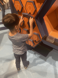 Max at the Fold the Shape game at the Technium exhibition at the Second Floor of the NEMO Science Museum