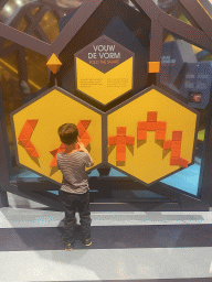 Max at the Fold the Shape game at the Technium exhibition at the Second Floor of the NEMO Science Museum