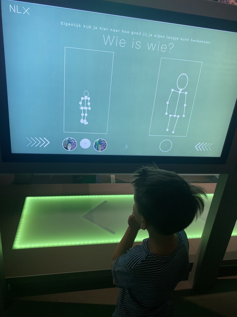 Max at the Who is Who? game at the Humania Exhibition at the Fourth Floor of the NEMO Science Museum
