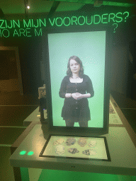 TV screens with information on human ancestor`s skulls at the Who Are My Ancestors game at the Humania Exhibition at the Fourth Floor of the NEMO Science Museum