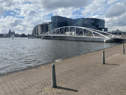 The Mr. J.J. van der Veldebrug bridge over the Oosterdok canal, the Basilica of Saint Nicholas, the Sea Palace restaurant and the Oosterdokseiland island, viewed from the Oosterdok street