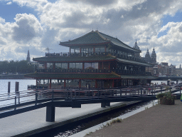 The Oosterdok canal with the Sea Palace restaurant, the Oude Kerk church and the Basilica of Saint Nicholas, viewed from the Oosterdok canal