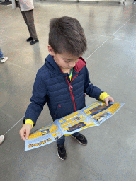 Max with the Pokémon scavenger hunt at the lower ground floor of the entrance building of the Van Gogh Museum