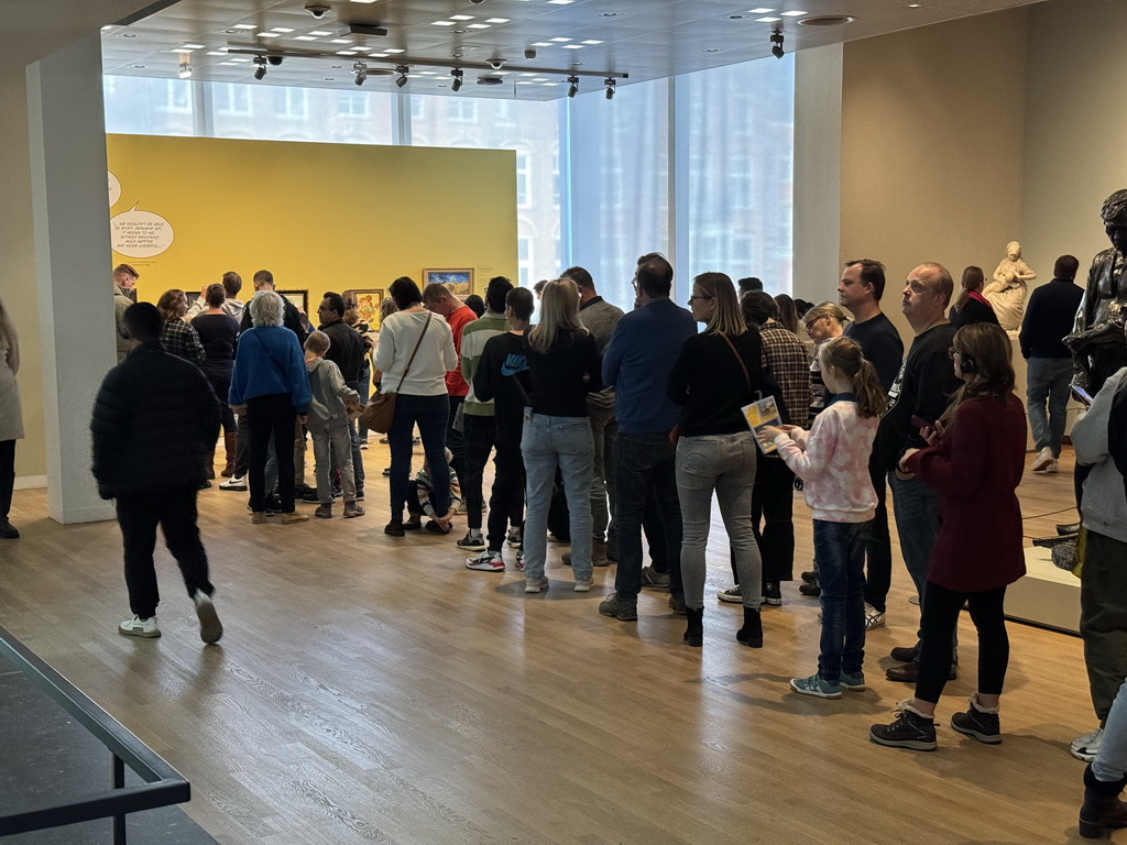 People waiting in line for the `Pokémon at the Van Gogh Museum` exhibition at the second floor of the Van Gogh Museum