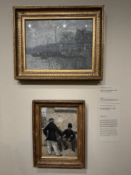 Paintings `View of Amsterdam` by Claude Monet and `The Old Officers` by Jean-François Raffaëlli at the second floor of the Van Gogh Museum, with explanation