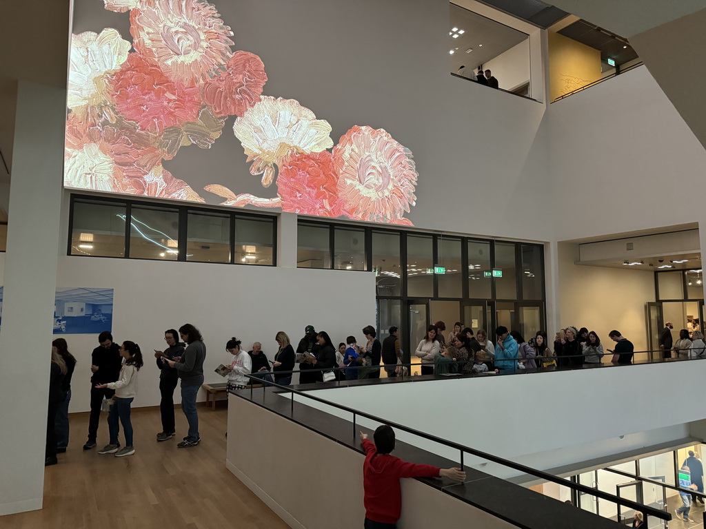 People waiting in line for the `Pokémon at the Van Gogh Museum` exhibition at the second floor of the Van Gogh Museum