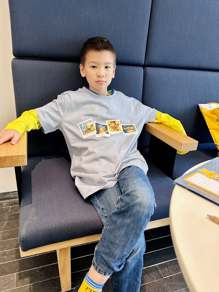 Max with Pokémon shirt at the café at the ground floor of the Van Gogh Museum