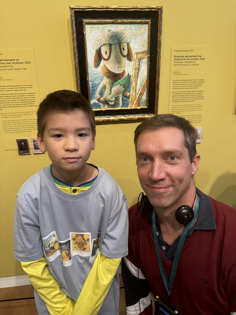 Tim and Max with the painting `Smeargle inspired by Self-Portrait as a Painter` by Tomokazu Komiya at the `Pokémon at the Van Gogh Museum` exhibition at the second floor of the Van Gogh Museum, with explanation