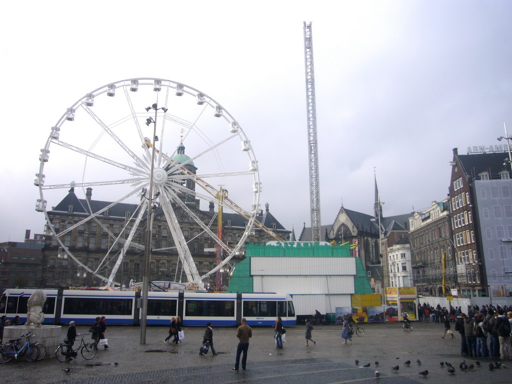 The Dam square, with the Royal Palace Amsterdam, the Nieuwe Kerk church and a Ferris Wheel