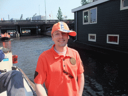 Robert on the tour boat at the Korte Prinsengracht canal, with the railway crossing