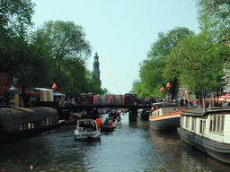 The Prinsengracht canal, with the bridge at the crossing of the Prinsenstraat street and the tower of the Westerkerk church