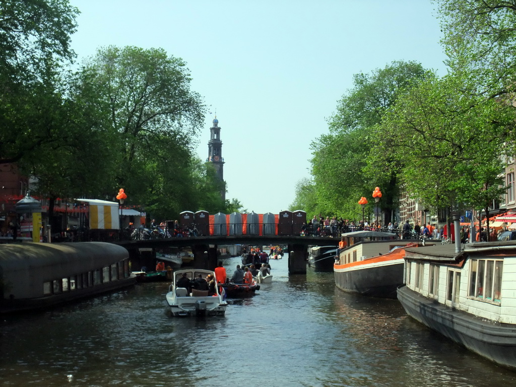 The Prinsengracht canal, with the bridge at the crossing of the Prinsenstraat street and the tower of the Westerkerk church