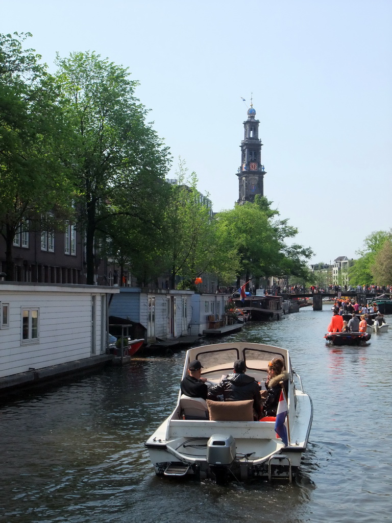 The Prinsengracht canal, with the bridge at the crossing of the Leliegracht canal and the tower of the Westerkerk church