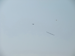 Airplane flying with a message banner over the city center