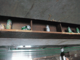 Beer cans under the bridge at the crossing of the Prinsengracht canal and Vijzelgracht canal