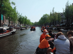 Robert, Irene, Jola, Rick, Mengjin and others on the tour boat at the Prinsengracht canal, with the Duif church