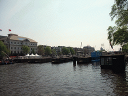 The Amstel river, the Amstelsluizen sluices and the Royal Theater Carré