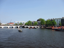 The Amstel river with the Magere Brug bridge and the Stopera