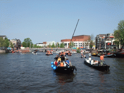 The Amstel river with the Blauwbrug bridge and the Stopera