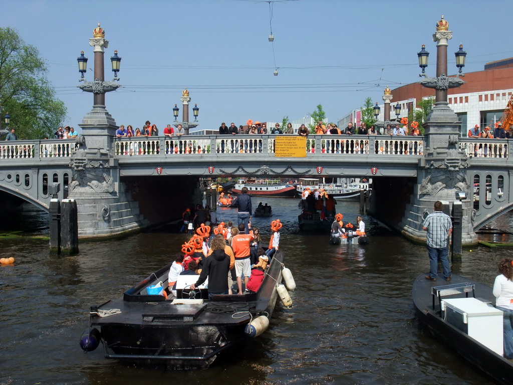 The Amstel river with the Blauwbrug bridge and the Stopera