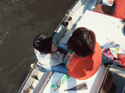 Miaomiao and Mengjin on the tour boat at the Droogbak canal