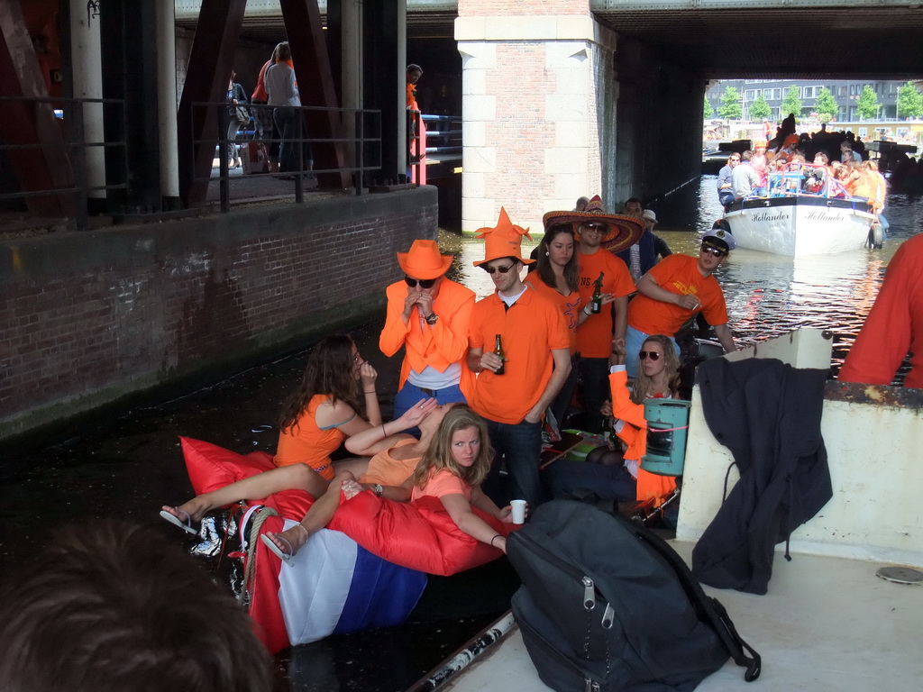 Tour boats under the railway crossing at the Westerdok canal