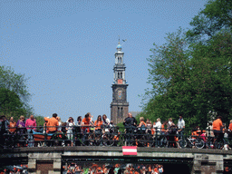 The bridge at the crossing of the Prinsengracht canal and the Reestraat street, and the tower of the Westerkerk church