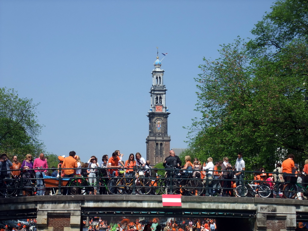 The bridge at the crossing of the Prinsengracht canal and the Reestraat street, and the tower of the Westerkerk church