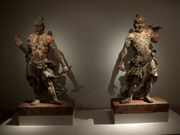 Japanese wooden statues of temple guards in the Asian Pavilion of the Rijksmuseum
