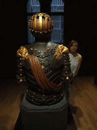 Miaomiao with an armour in the Ship Models room on the ground floor of the Rijksmuseum