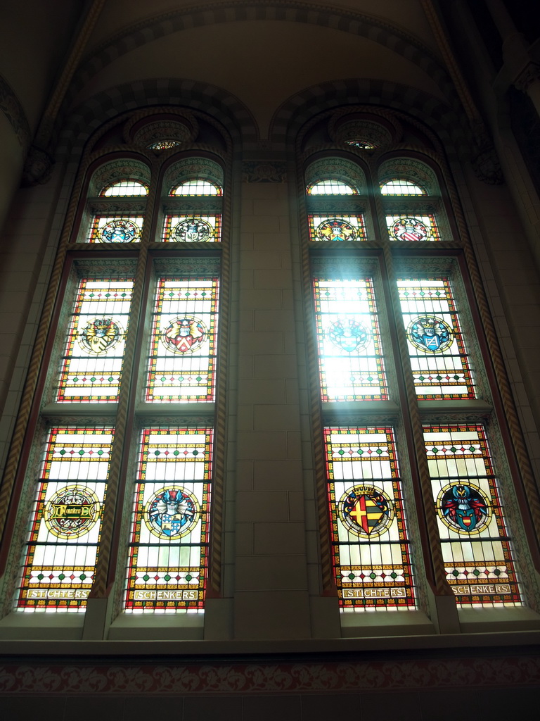 Stained glass windows in the staircase from the first to the second floor of the Rijksmuseum