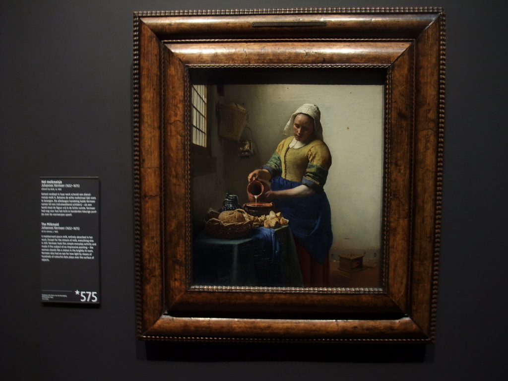 Painting `The Milkmaid`, by Johannes Vermeer, in the Gallery of Honour of the Rijksmuseum