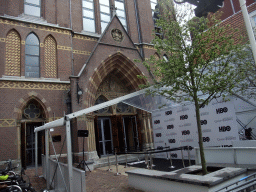 Front of the Posthoornkerk church at the Haarlemmerstraat street, with banners of `Game of Thrones: the Exhibition`