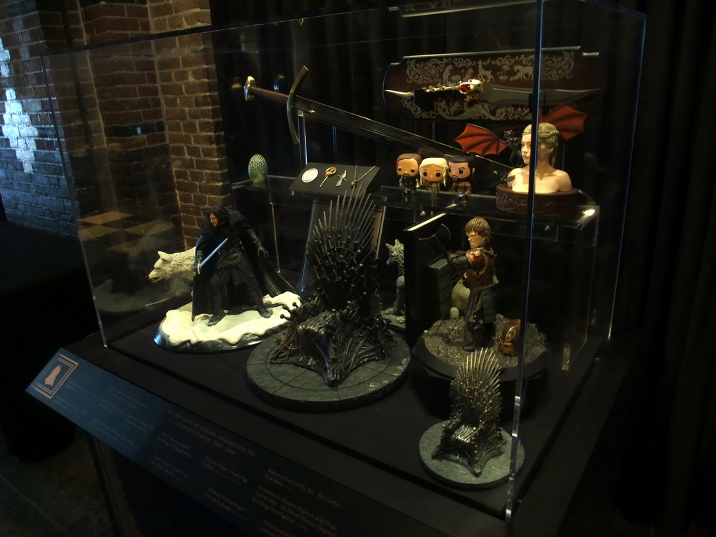 Scale models of the Iron Throne, statuettes and other objects at `Game of Thrones: the Exhibition` at the Posthoornkerk church