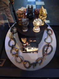 Statuettes of the Houses of Westeros, horseshoes and a photograph of Robb Stark at `Game of Thrones: the Exhibition` at the Posthoornkerk church