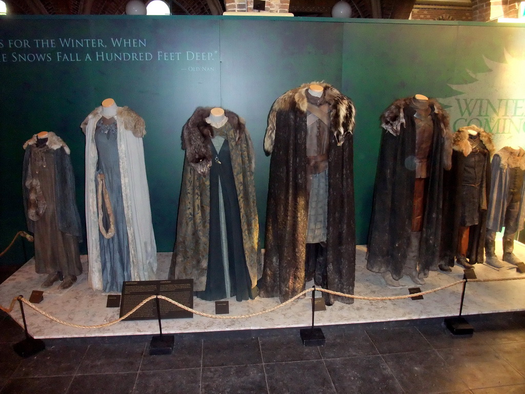 Costumes of the Stark family at `Game of Thrones: the Exhibition` at the Posthoornkerk church, with explanation