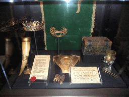 Crowns, horn, letters, cup and other objects at `Game of Thrones: the Exhibition` at the Posthoornkerk church