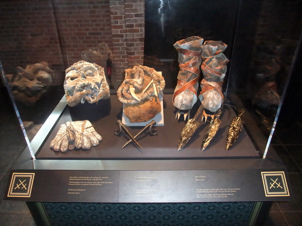 Mask, gloves, boots and other objects from Wildlings at `Game of Thrones: the Exhibition` at the Posthoornkerk church, with explanation