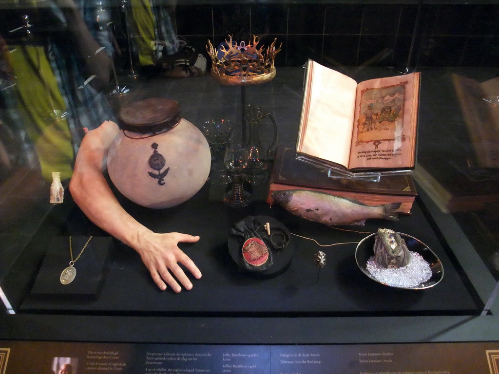 Joffrey Baratheon`s crown, a Lannister necklace, Tyrion`s Lannister`s books and other objects at `Game of Thrones: the Exhibition` at the Posthoornkerk church, with explanation