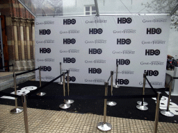 Banners of `Game of Thrones: the Exhibition` at the front of the Posthoornkerk church at the Haarlemmerstraat street