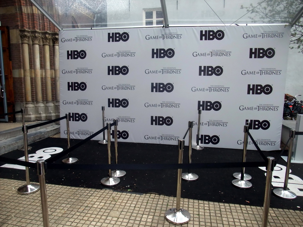 Banners of `Game of Thrones: the Exhibition` at the front of the Posthoornkerk church at the Haarlemmerstraat street