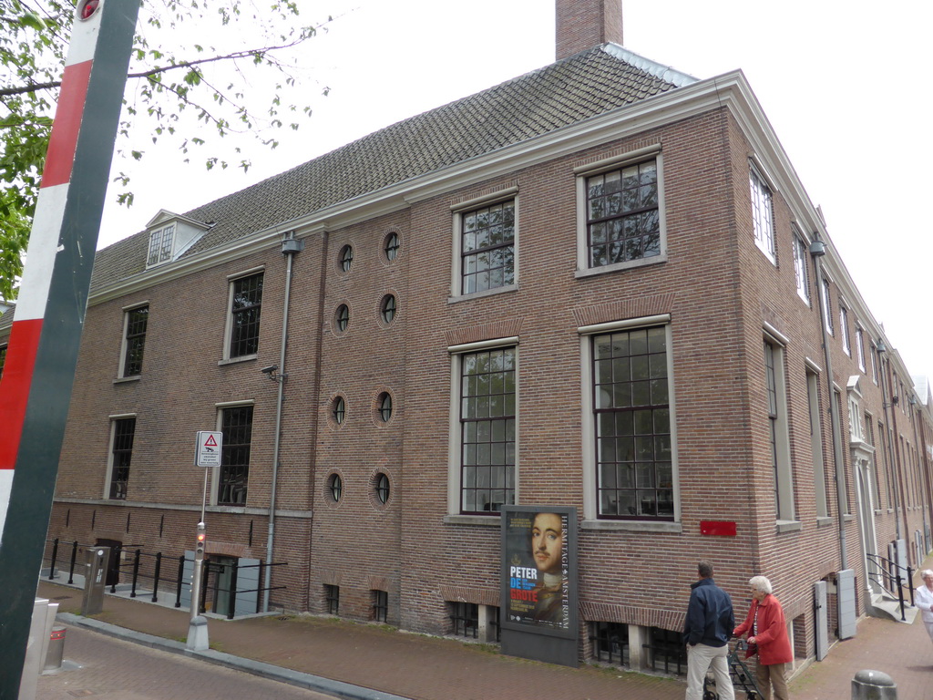Left side of the Hermitage Amsterdam museum at the Nieuwe Herengracht canal, with a poster of the exhibition on Peter the Great