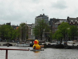 Boat with large plastic yellow duck on the Amstel river