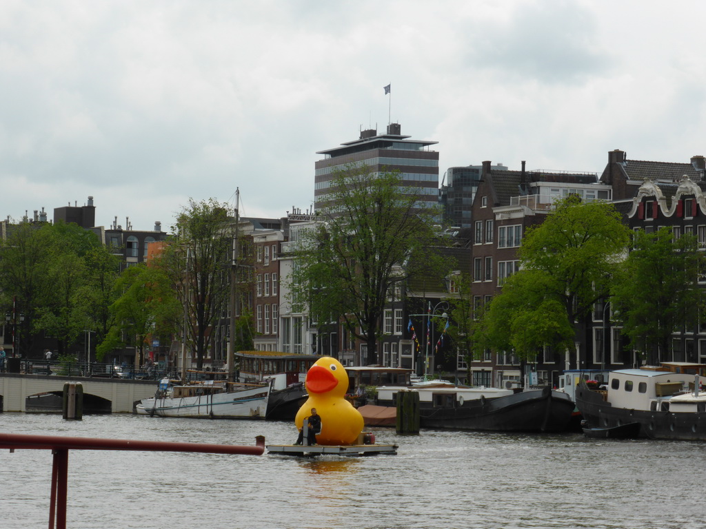 Boat with large plastic yellow duck on the Amstel river