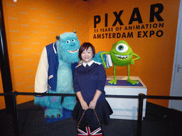 Miaomiao with characters from `Monsters Inc.` at the Pixar exhibition at the Amsterdam Expo building