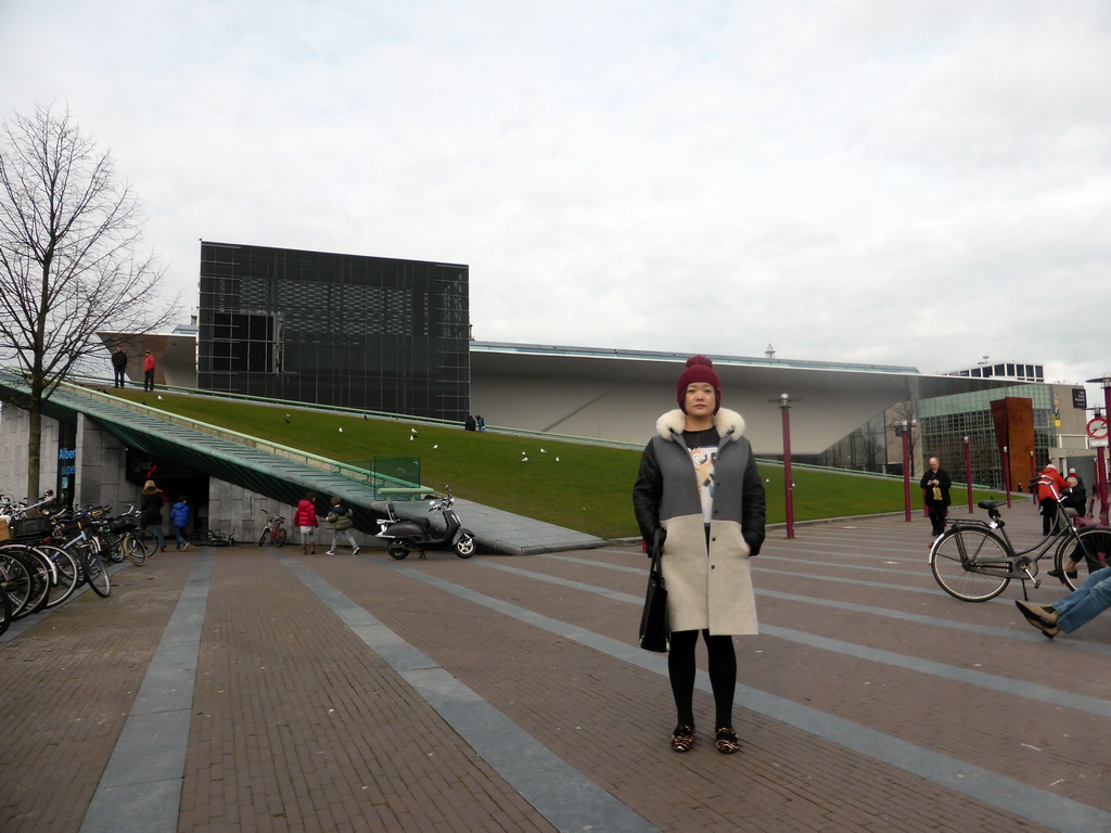 Miaomiao in front of the Stedelijk Museum Amsterdam at the Museumplein square