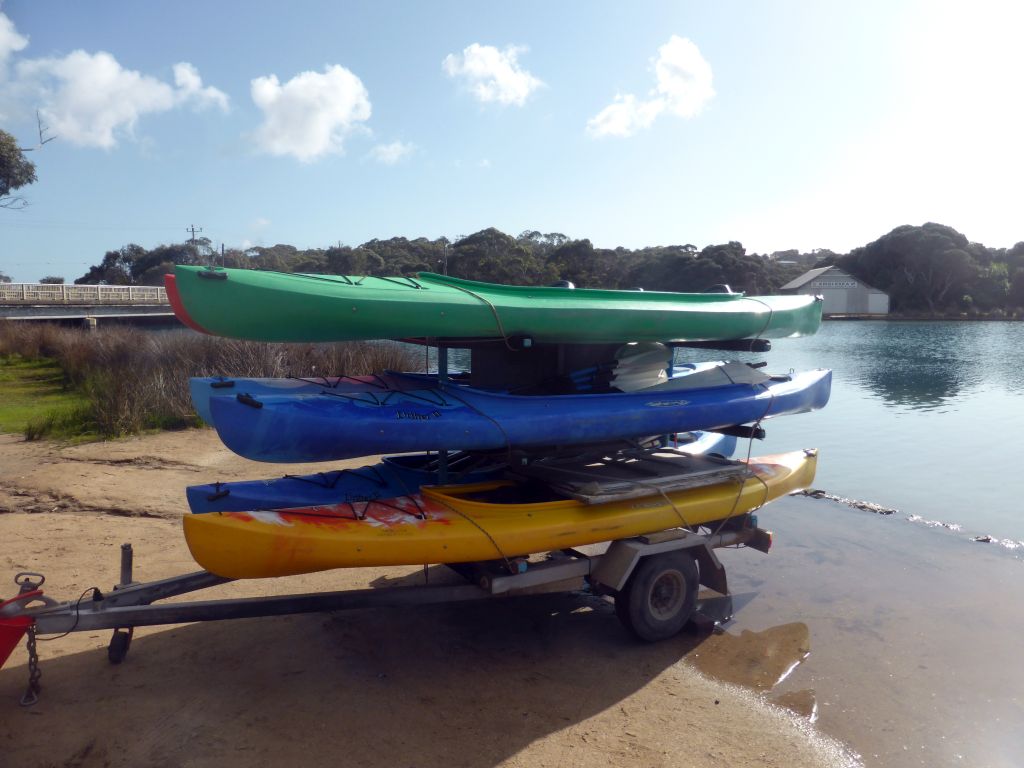 Boats at the parking place next to the Great Ocean Road, with a view on the Anglesea river and the Lions Park Reserve